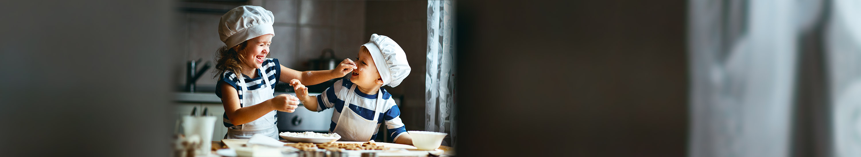 Girl and boy baking